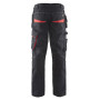 Pantalon + stretch noir/rouge avec poches flottantes